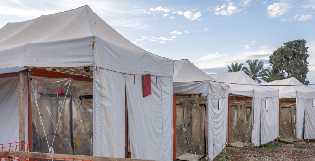 eni, North Kivu, Democratic Repulic of Congo (DRC) A row of so-called 'cubes', plastic Ebola treatment centres, run by The Alliance for International Medical Action (ALIMA) which can only be entered via a sealed door. Patients can be treated in isolation inside the cubes. Image credit: Sven Torfinn / Panos