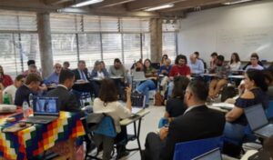 People sitting in a classroom attending a session