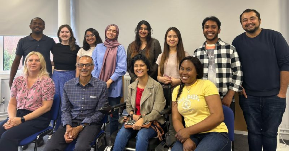 Ten mentees pictured with this year's group mentor, Roy Trivedy