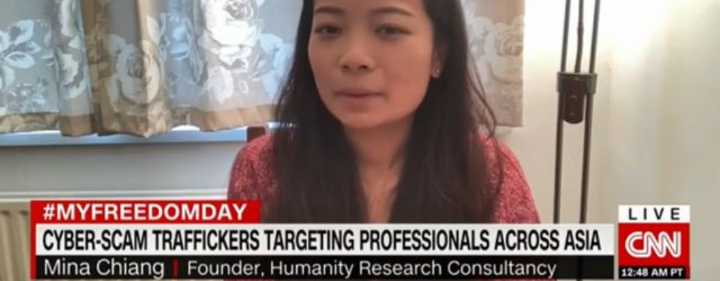 A woman with long dark hair speaking on the news, with the caption 'cyber scam traffickers targetting professionals across Asia